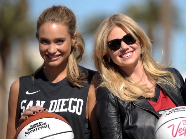 LVCVA And Sports Illustrated Models Support NCAA Basketball Conference Championship At Historic Las Vegas Sign